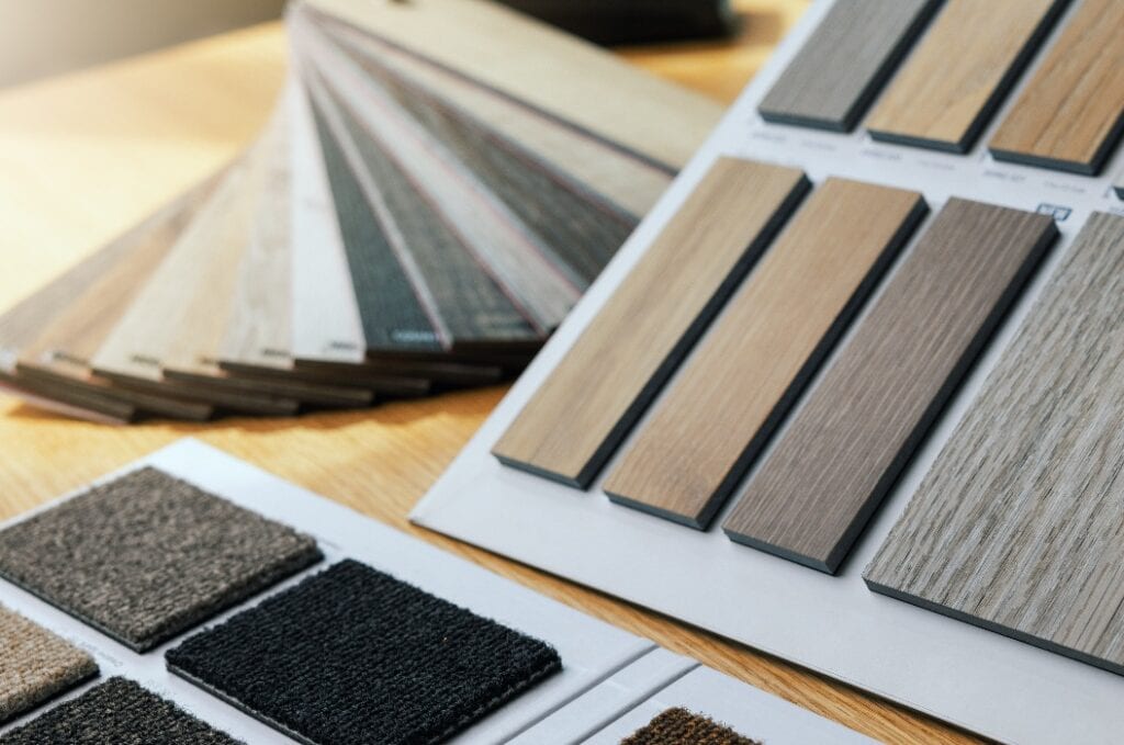 designer showing furniture and flooring material samples for interior design. banner with copy space