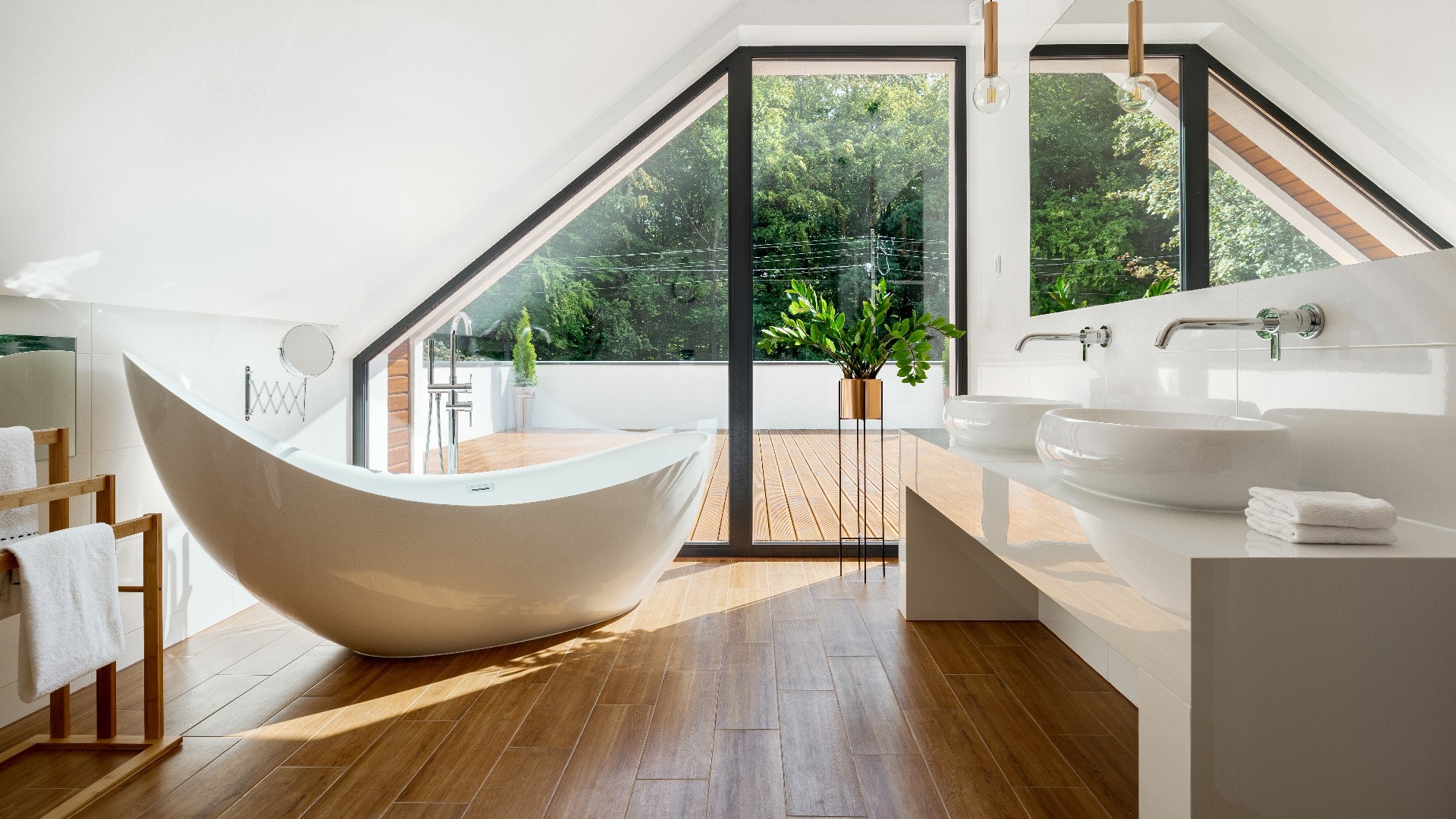 Elegant attic bathroom with bathtub